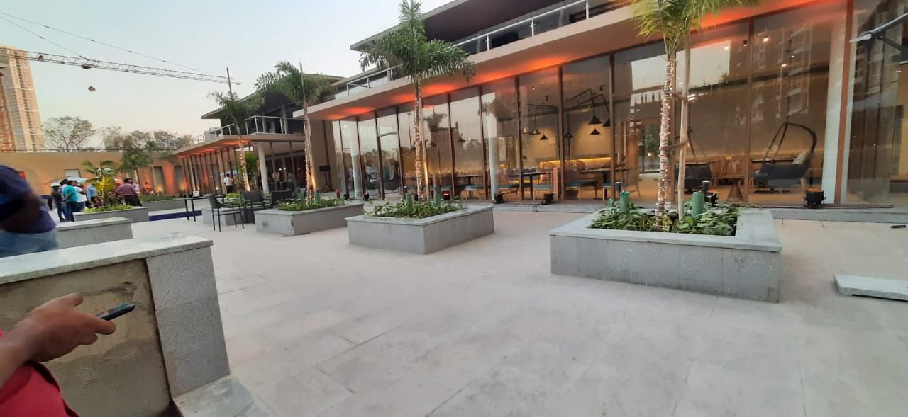 Glass and steel terrace railings at the Runwal Forest club house